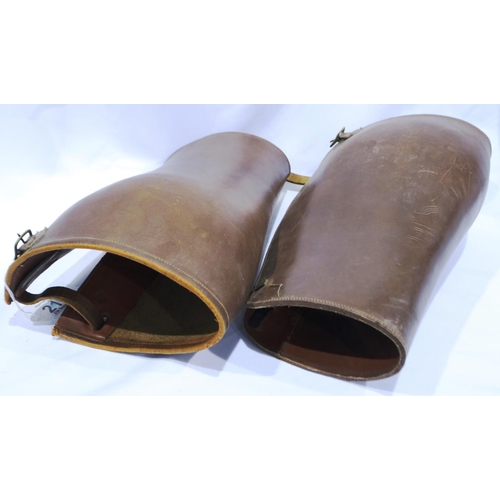 2102 - A pair of British military issue brown leather cavalry knee guards. P&P Group 2 (£18+VAT for the fir... 