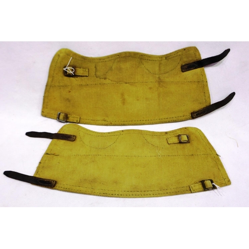 2103 - A pair of WWII British gaiters, dated 1944 with broad arrow. P&P Group 1 (£14+VAT for the first lot ... 