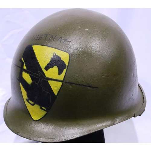 2137 - An American Vietnam war period M1 helmet, later painted with 1st Cavalry Division emblem. P&P Group ... 