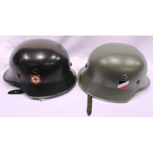 2141 - Two modern miniature German WWII steel helmets, each with leather liners. P&P Group 2 (£18+VAT for t... 