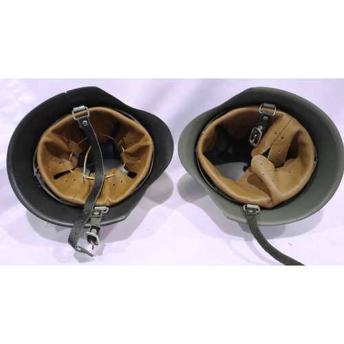 2141 - Two modern miniature German WWII steel helmets, each with leather liners. P&P Group 2 (£18+VAT for t... 