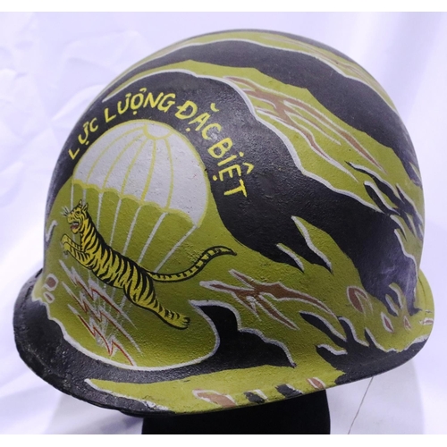 2145 - Vietnam War period US M1 helmet with ARVN Special Forces paintwork, later painted. P&P Group 2 (£18+... 