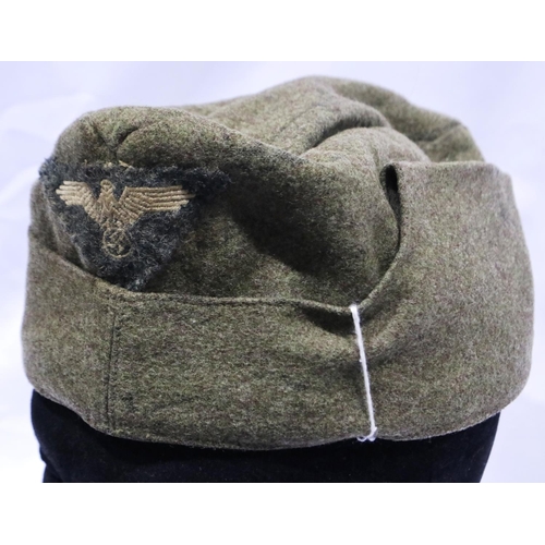 2154 - German WWII side cap with embroidered eagle, marked FM to lining. P&P Group 1 (£14+VAT for the first... 