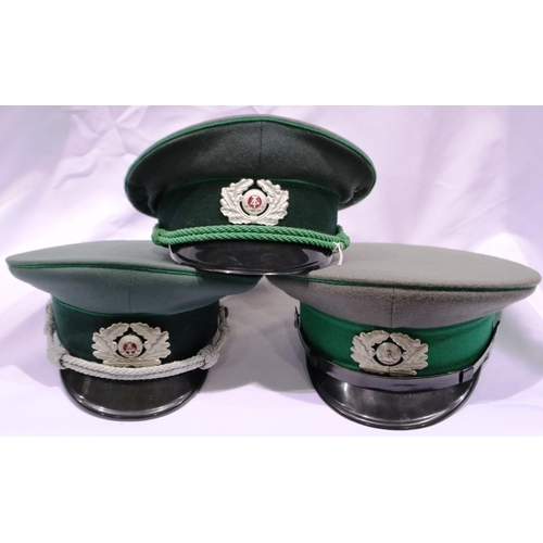 2157 - Three East German Border Guards officers / NCOs visor caps. P&P Group 2 (£18+VAT for the first lot a... 