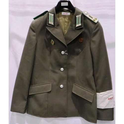 2165 - An East German NVA Medics tunic, with armband. P&P Group 3 (£25+VAT for the first lot and £5+VAT for... 