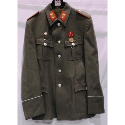 2170 - An East German NVA Paras parade tunic, with awards. P&P Group 3 (£25+VAT for the first lot and £5+VA... 