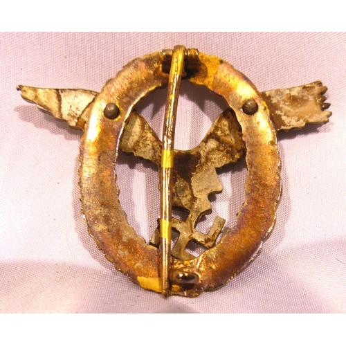 2187 - A German WWII Luftwaffe combined pilots/ observer badge, two-part construction marked Schwerin verso... 