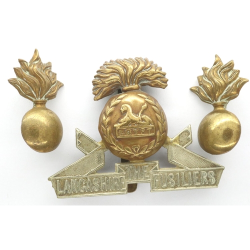 2203 - British WWI Lancashire Fusiliers cap badge with a pair of shoulder / collar flashes (3). P&P Group 1... 