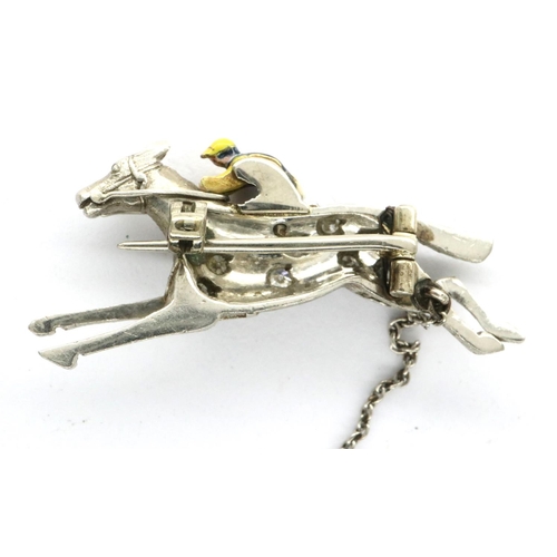 106 - Antique platinum, diamond and enamel race horse and jockey brooch, with safety chain, L: 31 mm, 8.4g... 