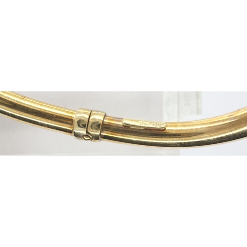 12 - An Italian 9ct gold rectangular form bangle with spring hinge and safety clasp, 65 x 55 mm, 4.5g. P&... 