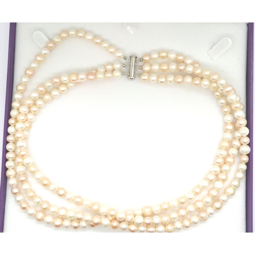 127 - Boxed three string faux pearl necklace with a 925 silver clasp, L: 47 cm. P&P Group 1 (£14+VAT for t... 