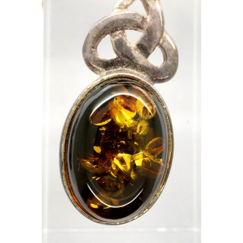 128 - Silver amber set pendant and earring set. P&P Group 1 (£14+VAT for the first lot and £1+VAT for subs... 