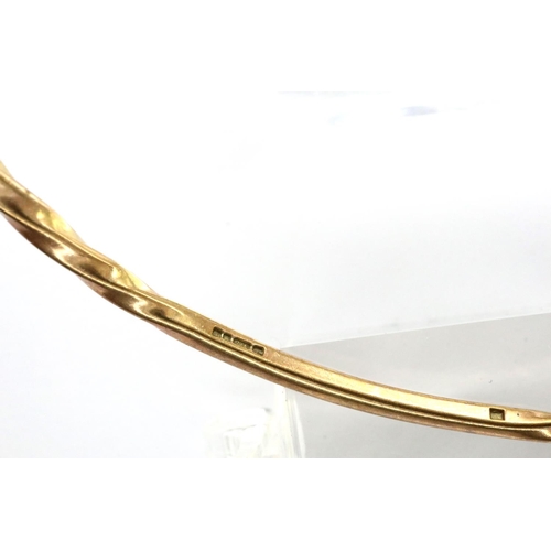 18 - 9ct gold circular twist form bangle, D: 70 mm, 8.3g. P&P Group 1 (£14+VAT for the first lot and £1+V... 