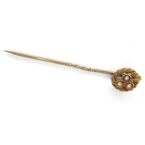 25 - 15ct gold stick pin set with seed pearls, L: 50 mm, 1.5g. P&P Group 1 (£14+VAT for the first lot and... 