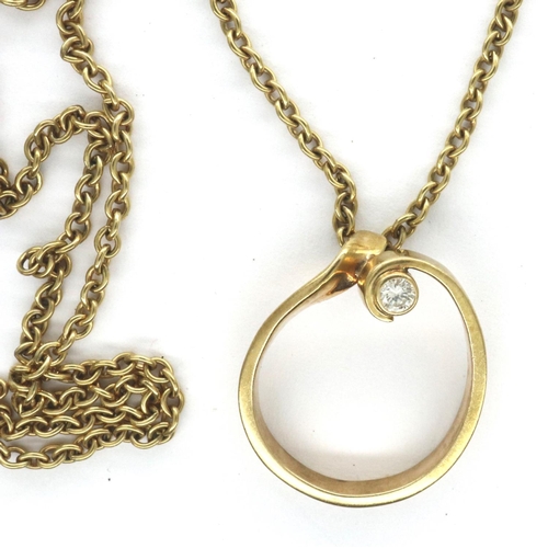 39 - A 9ct gold diamond set pendant on a 9ct gold chain, chain L: 40 cm, pendant D: 16 mm, combined 4.8g.... 