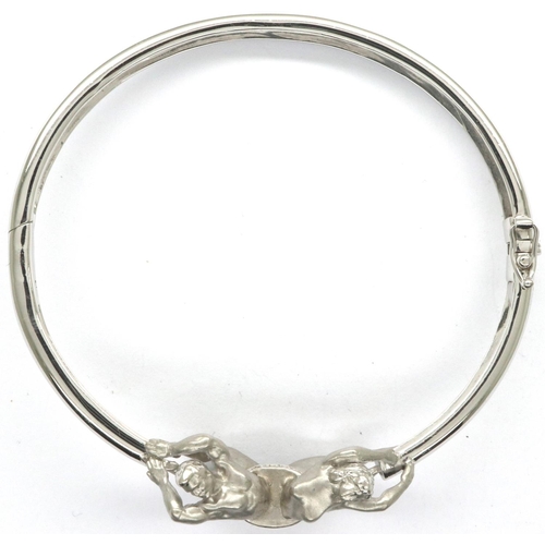 53 - Celeste designer 18ct white gold and white enamel stone set bangle, D: 60 mm, 27.4g. P&P Group 1 (£1... 