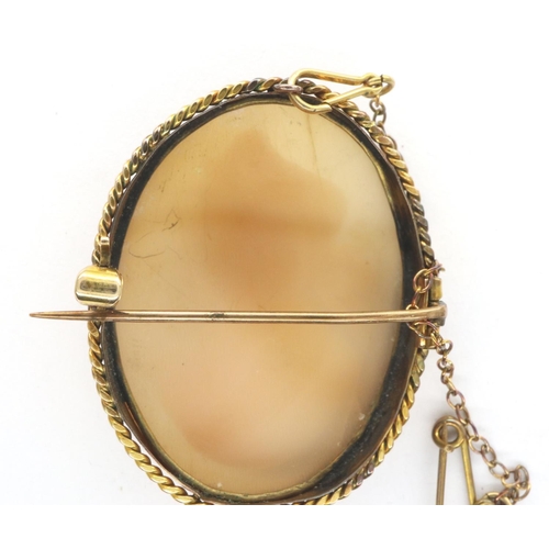 58 - Unmarked gold shell cameo brooch, H: 38 mm, 6.1g. P&P Group 1 (£14+VAT for the first lot and £1+VAT ... 