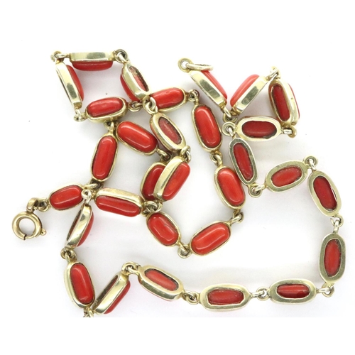 92 - Yellow metal and coral necklace, chain L: 44 cm, 22g. P&P Group 1 (£14+VAT for the first lot and £1+... 