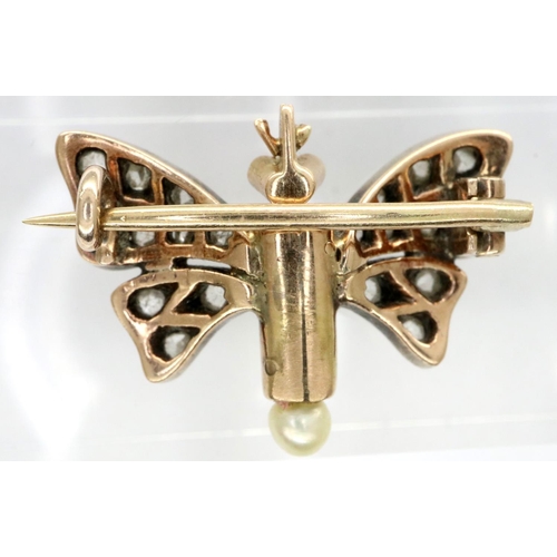 95 - Georgian (presumed, unmarked) 15ct gold butterfly form brooch, with garnet set eyes and diamond set ... 