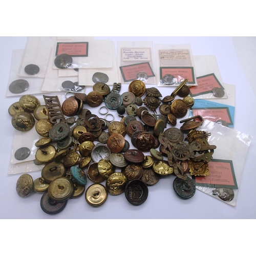 2177 - A large collection of mostly battlefield recovered uniform buttons, pips etc, including William IV a... 