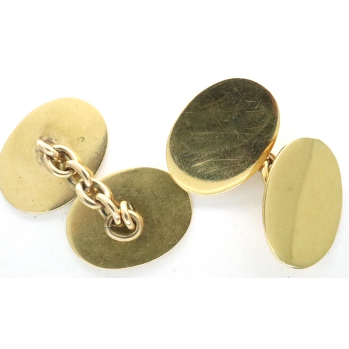 110 - A near pair of 18ct gold oval cufflinks, combined 12.2g, one hallmarked, light surface scratches and... 