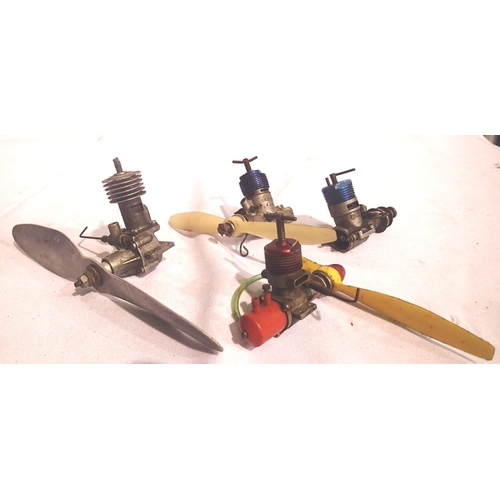 2004 - Four remote control aircraft engines and propeller. P&P Group 2 (£18+VAT for the first lot and £3+VA... 