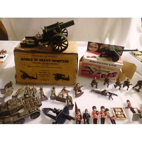 2033 - Britains military including 18 Howitzer and 120 mm B.A.T gun, both boxed, plus a selection of figure... 