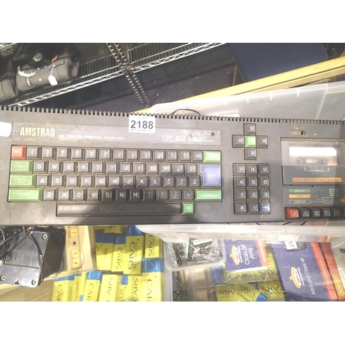 2188 - Amstrad 64k colour personal computer plus power pack and selection of games. Not available for in-ho... 