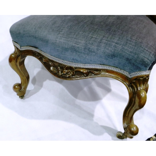 At Auction: Carved Armchair and Low Foot Stool