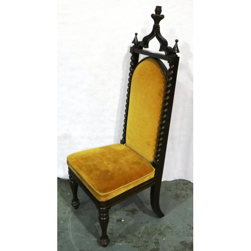 3021 - A Victorian mahogany hall chair, upholstered and carved in the Gothic manner. Not available for in-h... 