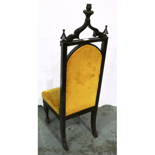 3021 - A Victorian mahogany hall chair, upholstered and carved in the Gothic manner. Not available for in-h... 