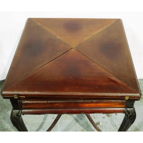 3023 - A Victorian mahogany card table with envelope fold action, single drawer and carved supports, 79 x 7... 