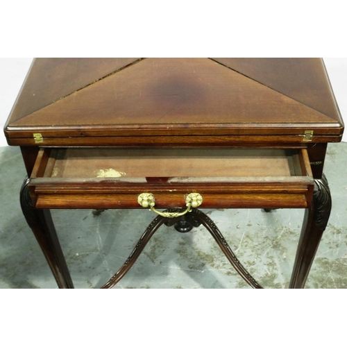 3023 - A Victorian mahogany card table with envelope fold action, single drawer and carved supports, 79 x 7... 