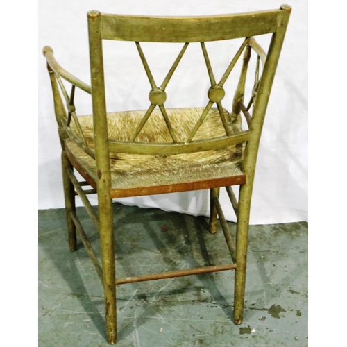 3033 - A Continental early 20th century elm chair with rush seat, stripped and printed, some old woodworm h... 