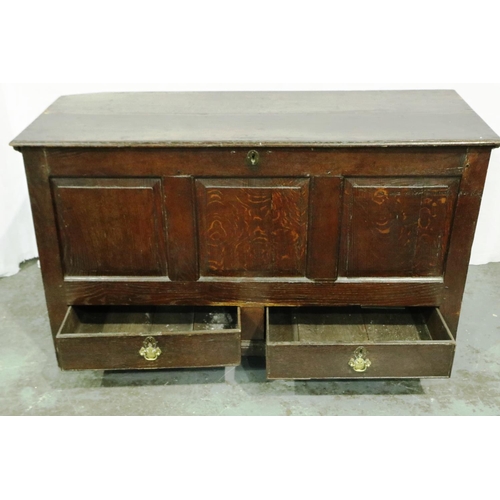 3039 - An 18th century oak coffer, with panelled front and two lower drawers, 132 x 53 x 77 cm H. Not avail... 