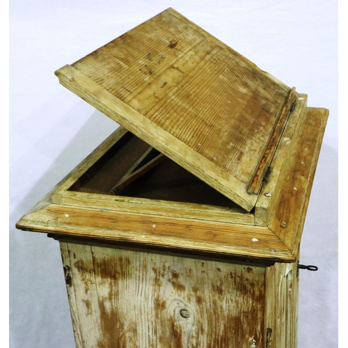 3041 - An ecclesiastical whitewashed pine lectern, with adjustable bookstand and cupboard below, 54 x 37 x ... 