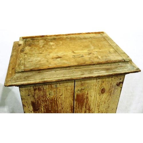 3041 - An ecclesiastical whitewashed pine lectern, with adjustable bookstand and cupboard below, 54 x 37 x ... 