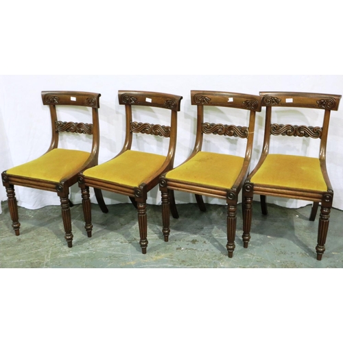 3067 - A set of four regency period walnut framed dining chairs with later upholstered drop in seats and ca... 