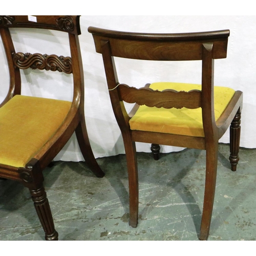 3067 - A set of four regency period walnut framed dining chairs with later upholstered drop in seats and ca... 