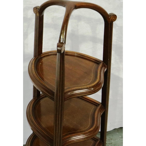 3085 - An Edwardian shaped walnut three tier plate stand, inlaid with a fixed superstructure, H: 83 cm. Not... 