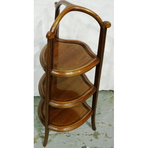 3085 - An Edwardian shaped walnut three tier plate stand, inlaid with a fixed superstructure, H: 83 cm. Not... 