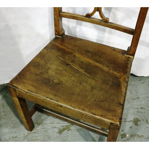 3087 - An early 19th century elm chair with crossed back stretcher. Not available for in-house P&P