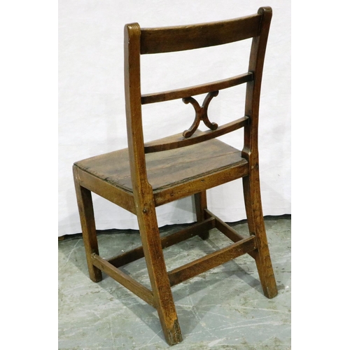 3087 - An early 19th century elm chair with crossed back stretcher. Not available for in-house P&P