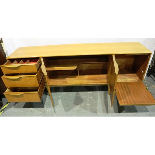 3114 - A mid 20th century teak asymmetric sideboard of cupboards and drawers, unnamed 202 x 46 x 76 cm H, g... 