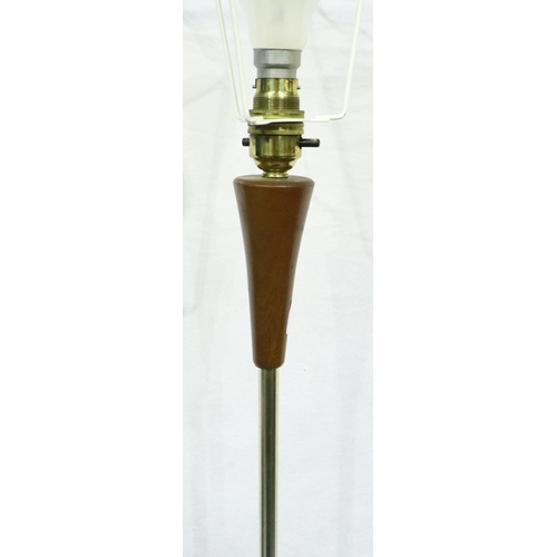 3127 - A 1960s standard lamp, the column formed from teak and brushed steel, H: 150 cm. Not available for i... 