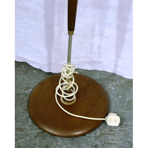 3127 - A 1960s standard lamp, the column formed from teak and brushed steel, H: 150 cm. Not available for i... 