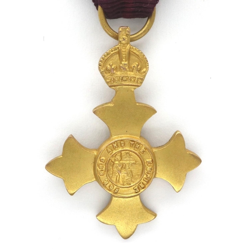 25 - 9ct gold miniature OBE medal, D: 21 mm, 4.8g. P&P Group 1 (£14+VAT for the first lot and £1+VAT for ... 