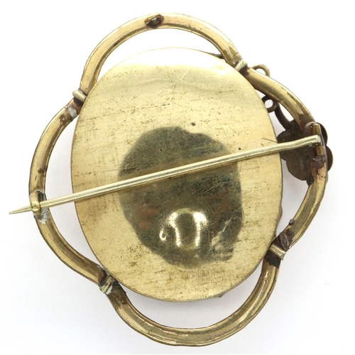 37 - Pinchbeck brooch with portrait of a girl, H: 70 mm. P&P Group 1 (£14+VAT for the first lot and £1+VA... 