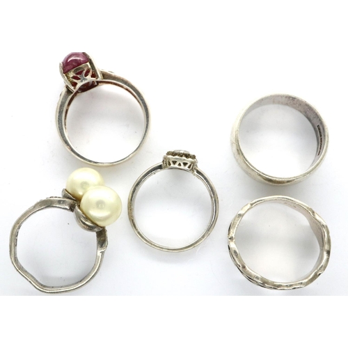 42 - Five hallmarked and 925 silver rings, sizes P - K, one misshapen, combined 17g. P&P Group 1 (£14+VAT... 