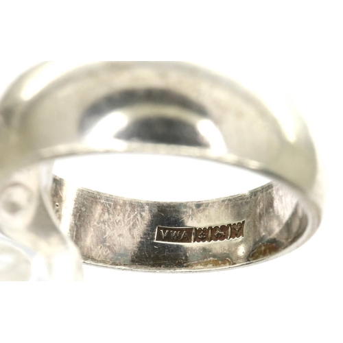 42 - Five hallmarked and 925 silver rings, sizes P - K, one misshapen, combined 17g. P&P Group 1 (£14+VAT... 